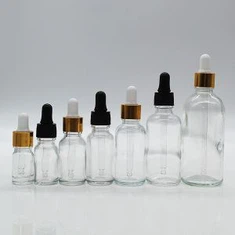 בקבוק זכוכית שקופה עם טפטפת